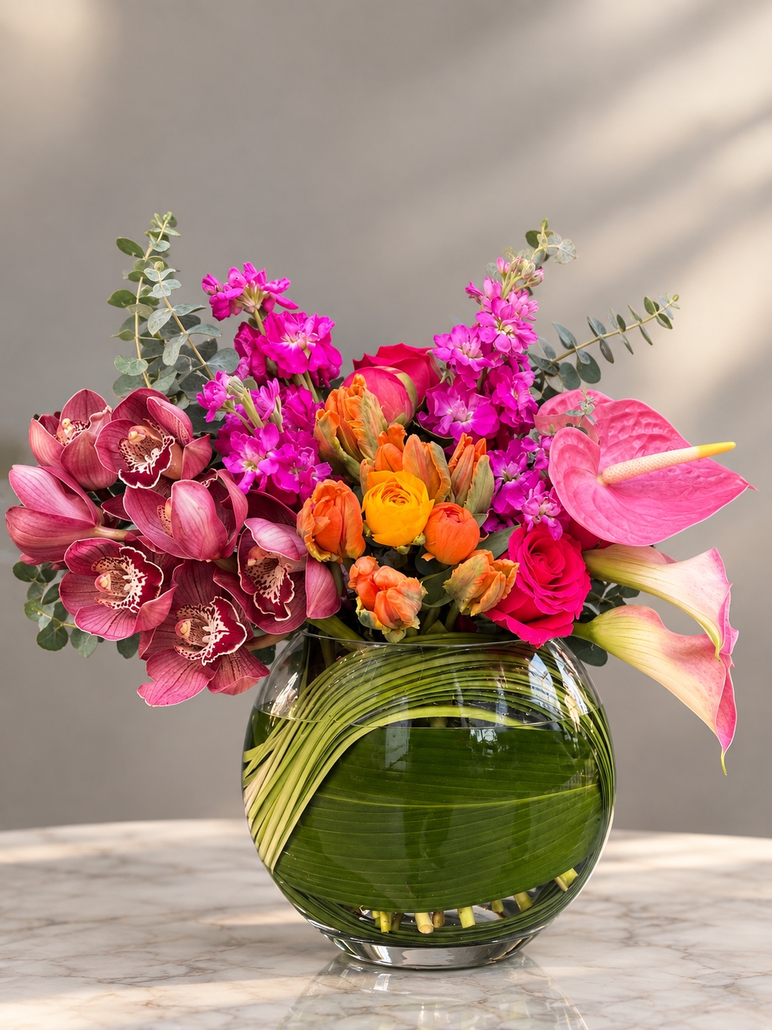 Sunset Orchid jewel-toned floral arrangement